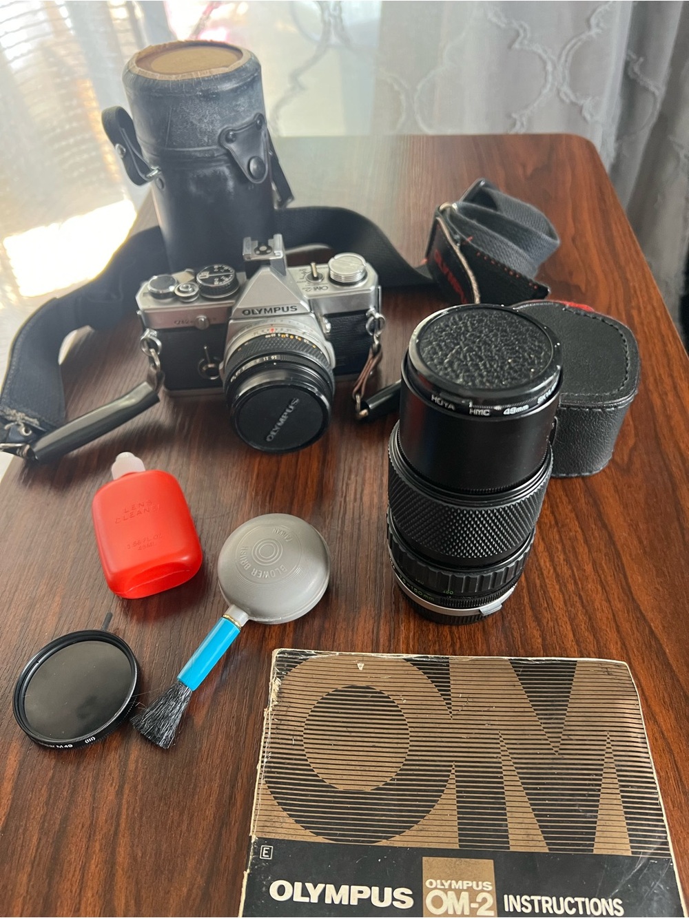 Olympus OM-2 Silver and Black 35mm SLR with Black Telephoto Lens